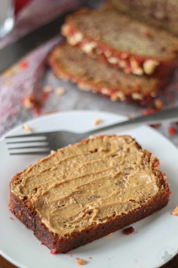 Peanut Butter and Jelly Banana Bread is a PB & J lovers dream!  Switch up the jelly to create your ultimate sandwich in a baked bread form. | Strawberry Blondie Kitchen