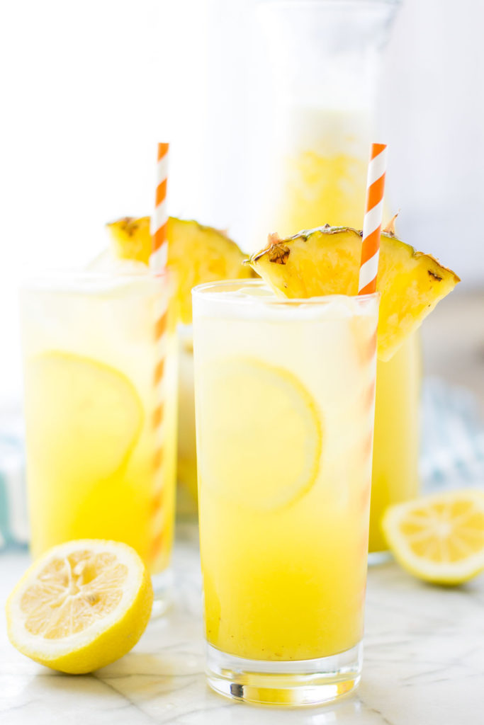 Pineapple pairs with spicy ginger and tart lemonade in sweet harmony to create this Pineapple Ginger Lemonade that is worthy of your next summertime sipper! | Strawberry Blondie Kitchen