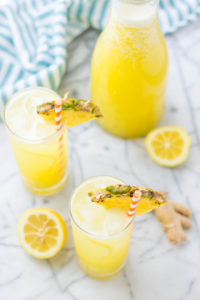 Pineapple pairs with spicy ginger and tart lemonade in sweet harmony to create this Pineapple Ginger Lemonade that is worthy of your next summertime sipper! | Strawberry Blondie Kitchen