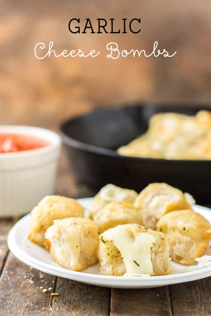 Savory bites of gooey cheese and garlic, these Garlic Cheese Bombs will be your new go to appetizer, snack or side dish for any occasion!  | Strawberry Blondie Kitchen