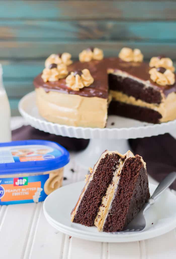 Rich chocolate espresso cakes are layered with Pillsbury™ Peanut Butter Frosting made with real Jif® Peanut Butter to create this Peanut Butter Espresso Cake which is the ultimate cake lover’s dream! | Strawberry Blondie Kitchen