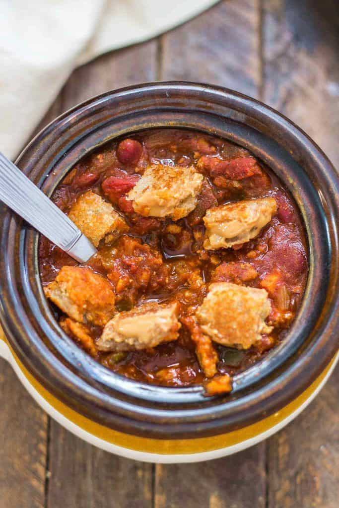 Crockpot Chili with Peanut Butter Sandwich Croutons combines your childhood favorite into one bowl of comforting chili to perfectly warm you to your core this crisp and cool Fall season!  | Strawberry Blondie Kitchen