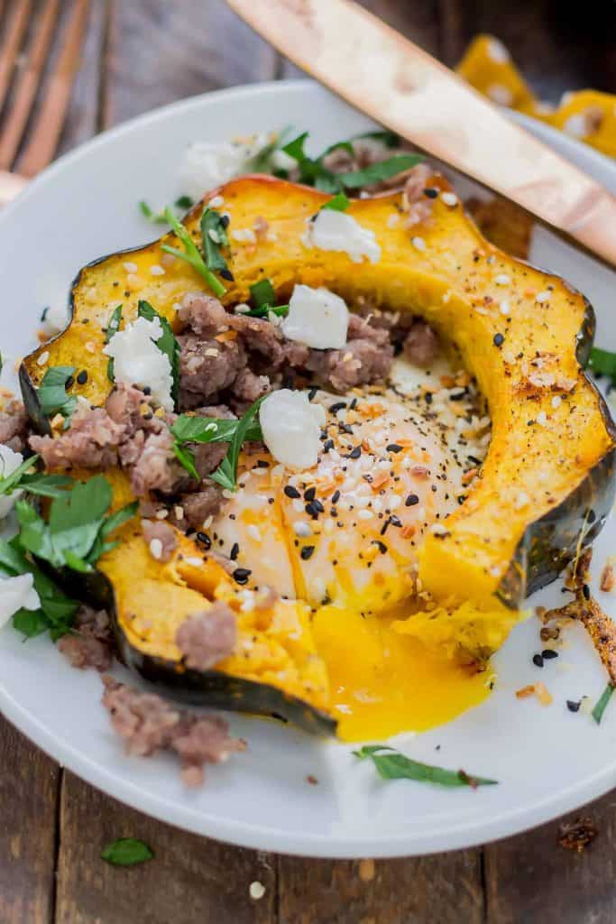 Everything Bagel Squash Egg in the Hole is the BEST breakfast sandwich but in fork and knife form.  Squash, egg, everything bagel seasoning, sausage and goat cheese, it's the ultimate egg in the hole. | Strawberry Blondie Kitchen