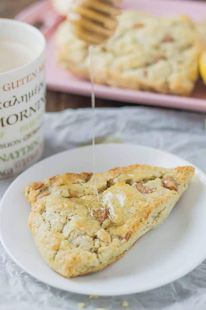 Soft and sweet, with pillows of pear and rich blue cheese and a drizzle of honey, these Pear and Blue Cheese Scones are the perfect pair with your morning cup of coffee! | Strawberry Blondie Kitchen