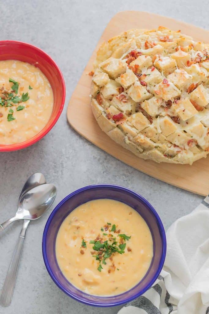 Warm up this season with Idahoan® Steakhouse® Soups and this delicious Cheddar Bacon Ranch Pull Apart Bread.  The perfect winning combination to keep cozy this season. | Strawberry Blondie Kitchen