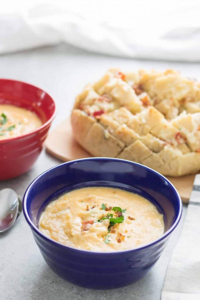 Warm up this season with Idahoan® Steakhouse® Soups and this delicious Cheddar Bacon Ranch Pull Apart Bread.  The perfect winning combination to keep cozy this season. | Strawberry Blondie Kitchen