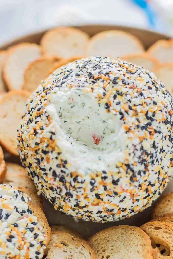 This Crab and Everything Bagel Cheese Ball is packed with crab, fresh herbs and rolled in everything bagel seasoning.  Anappetizer worthy of your next get together! | Strawberry Blondie Kitchen