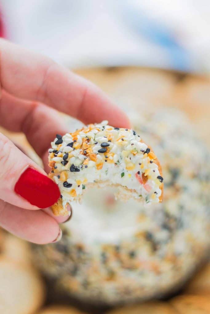 This Crab and Everything Bagel Cheese Ball is packed with crab, fresh herbs and rolled in everything bagel seasoning.  An appetizer worthy of your next get together! | Strawberry Blondie Kitchen