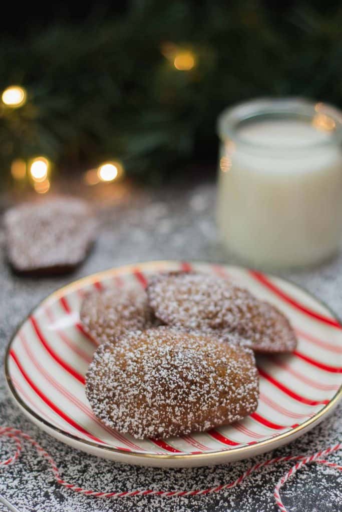 Gingerbread Madeleines are the perfect soft and buttery sponge cakes to send your tastebuds right into the holiday season! | Strawberry Blondie Kitchen
