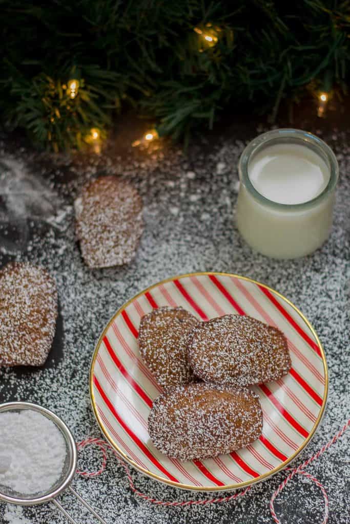 Gingerbread Madeleines are the perfect soft and buttery sponge cakes to send your tastebuds right into the holiday season! | Strawberry Blondie Kitchen