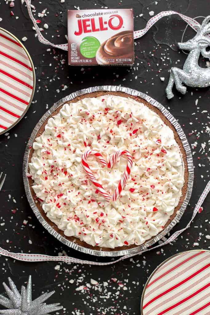 Overhead shot of no bake candy cane pie with a heart candy cane on the top