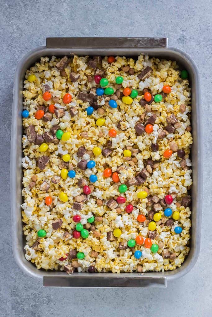 Rocky Road to Victory Popcorn is a game day lovers dream.  Rich chocolate, salty popcorn and bits of candy pieces make this popcorn mix a must have at your next home gate! | Strawberry Blondie Kitchen