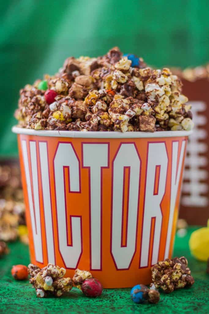 Rocky Road to Victory Popcorn is a game day lovers dream.  Rich chocolate, salty popcorn and bits of candy pieces make this popcorn mix a must have at your next home gate! | Strawberry Blondie Kitchen