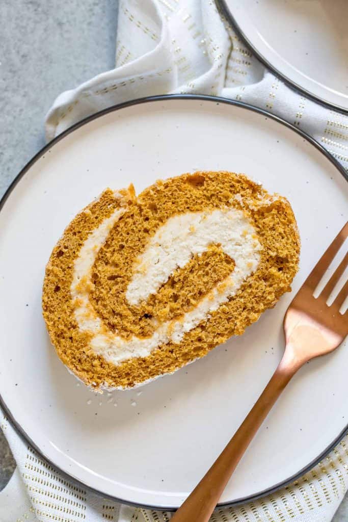 This Pumpkin Cake Roll with Cookie Butter Filling is a classic pumpkin cake roll but with an extra special filling.  It's the BEST pumpkin cake roll you'll ever have, promise! 