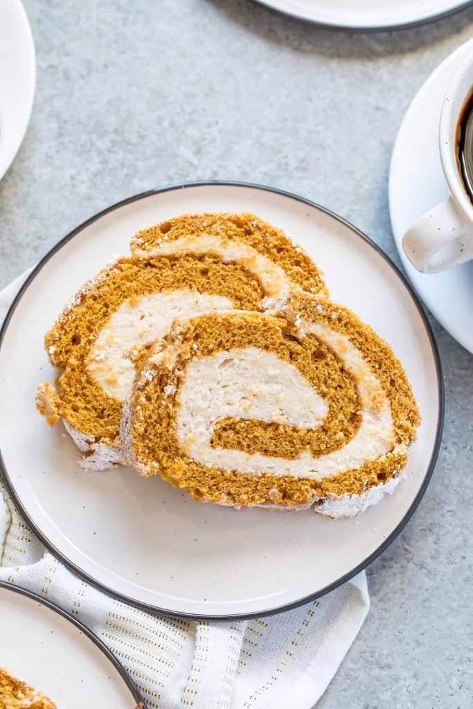 This Pumpkin Cake Roll with Cookie Butter Filling is a classic pumpkin cake roll but with an extra special filling.  It's the BEST pumpkin cake roll you'll ever have, promise! 