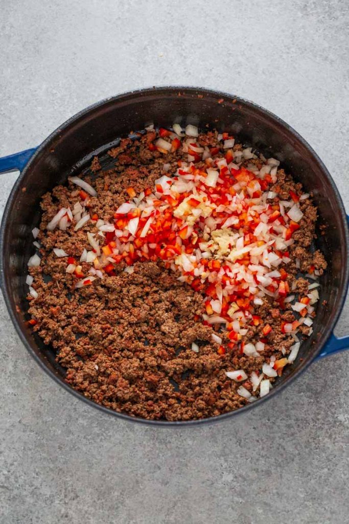 Beef and chorizo cooked with red bell pepper, onion and garlic for baked beef empanadas