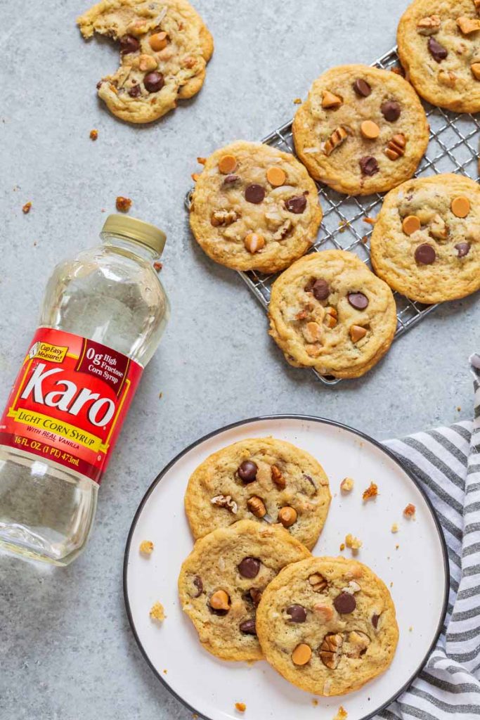 Chewy Seven Layer Cookies are stuffed full of chocolate and butterscotch chips, coconut and pecans.  They're super chewy and soft using a secret ingredient to make them the BEST cookie recipe!