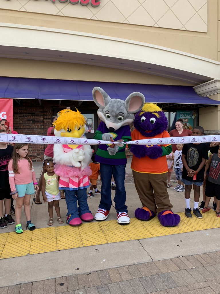 Chuck E. Cheese grand reopening ribbon cutting Peoria, IL 