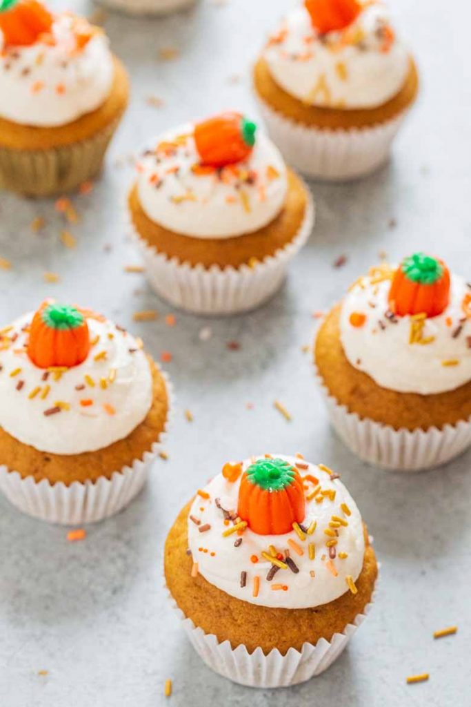 These Pumpkin Cupcakes with Marshmallow Frosting are super soft, moist and topped with a delicious and fluffy marshmallow cream cheese frosting!  You'll love every bite. 