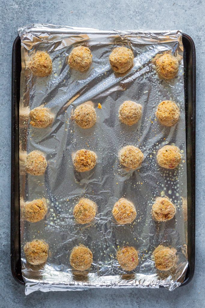 Pumpkin Sausage Cheese Balls on a sheet pan