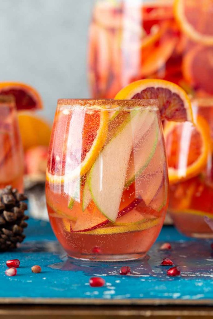 Blood Orange Party Punch is a boozy concoction of Falls delicious bounty. Filled with pomegranates, apples, pears, lemons cranapple juice, wine and champagne it's the ultimate cocktail to serve for all your Autumn festivities!