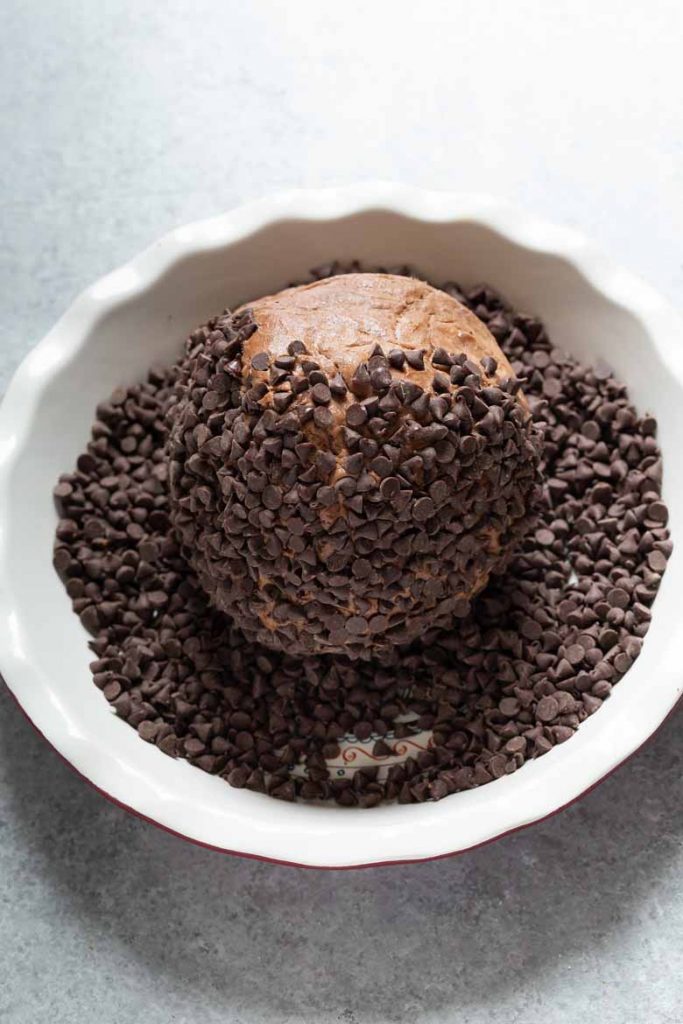 Roll chocolate dessert cheese ball into mini chocolate chips