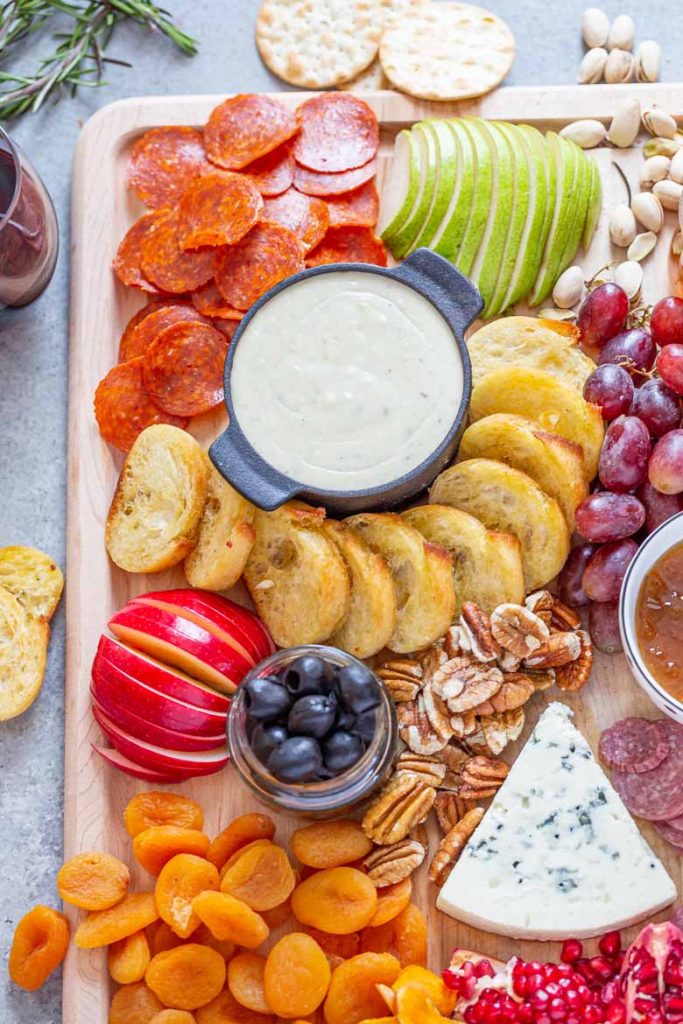 Blue Cheese fondue and gorgonzola cheese on a charcuterie board