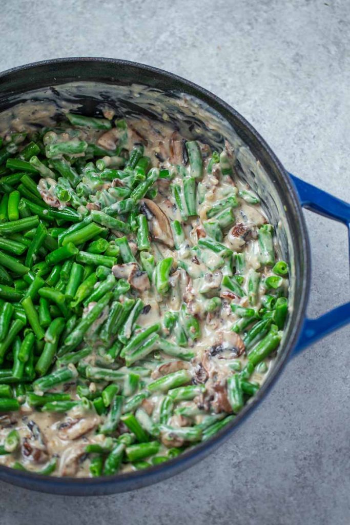 Add cooked green beans into homemade cream of mushroom soup