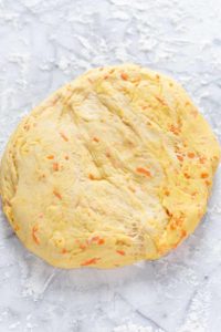 ball of carrot cake cinnamon roll dough
