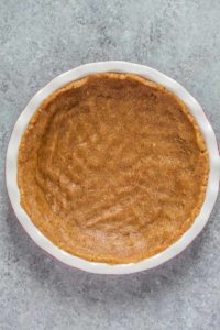 no bake pecan pie crust pressed into pie pan