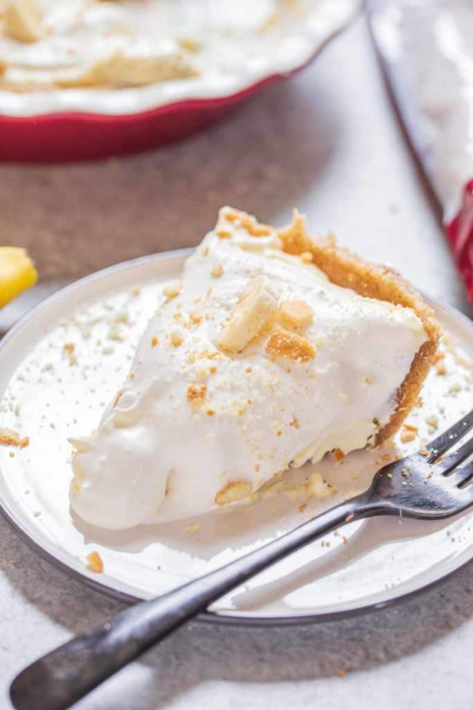 slice of This No Bake Banana Cream Pie with Pecan Crust