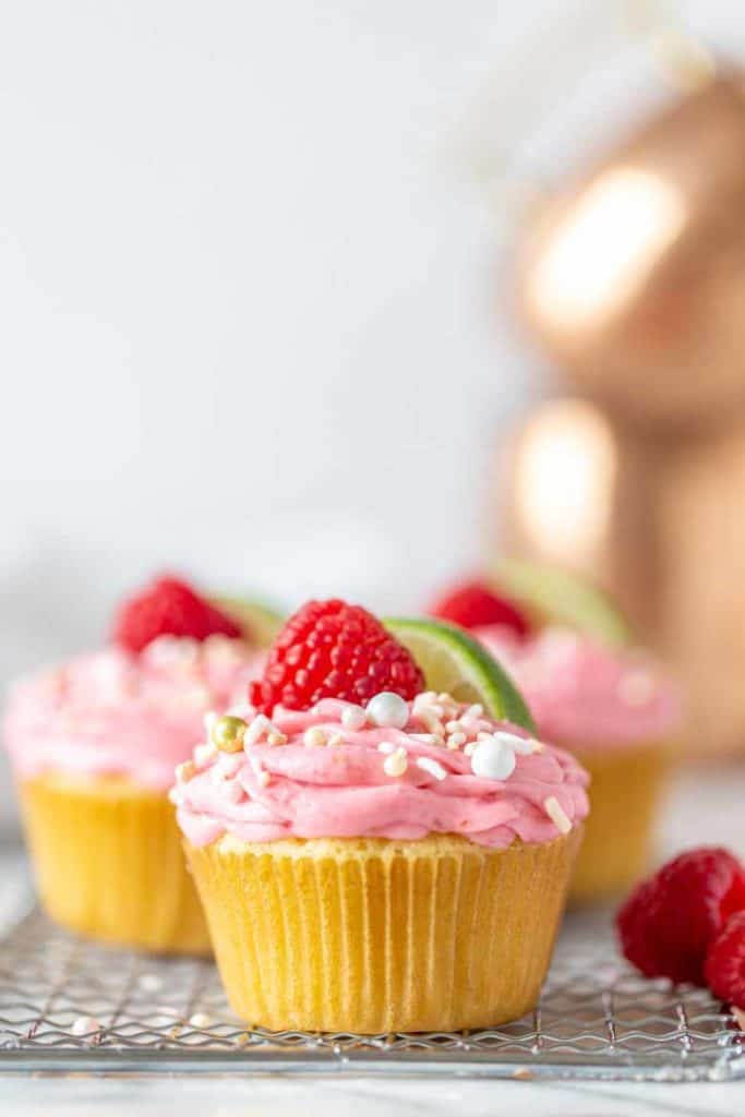 Single shot of raspberry Moscow Mule Cupcake with raspberry buttercream