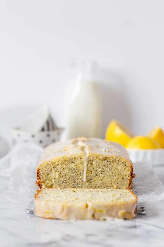 straight on view of Lemon Poppy Seed Loaf with Glaze cut into slices