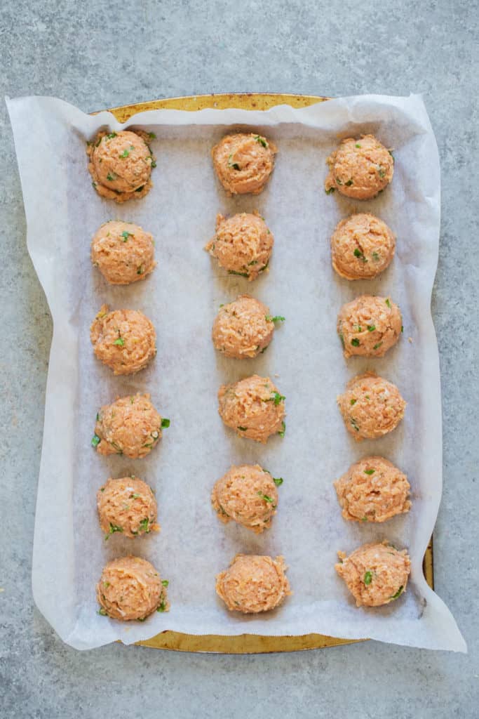 place chicken meatballs on sheet pan until ready to use