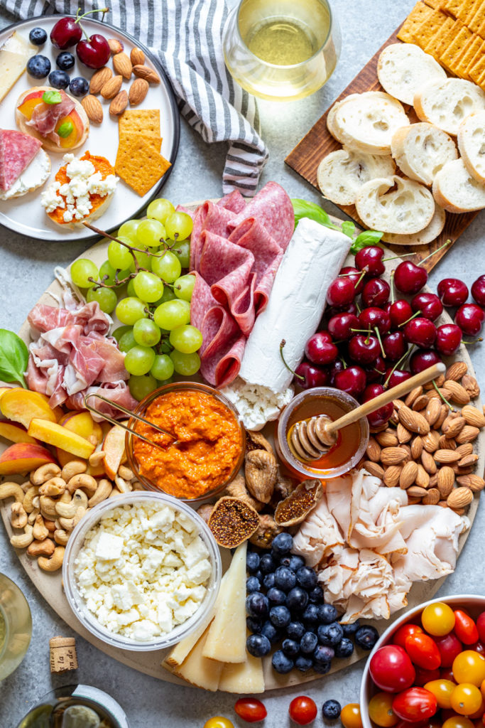 A charcuterie board is perfect for entertaining. It's filled with fingers food and snacks