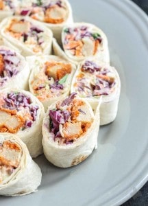 All your favorite flavors of a buffalo wing rolled up into one delicious, snack sized bite in these Buffalo Wing Pinwheels. Made with MorningStar Farms® Buffalo Wings and a blue cheese coleslaw, these are sure to be an all around favorite at your next get together! | Strawberry Blondie Kitchen