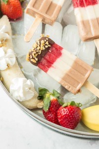 Layers of fresh strawberries, Sir BananamilkTM, and Sir Chocolate BananamilkTM make these Banana Split Popsicles irresistible to both adults and children alike. | Strawberry Blondie Kitchen