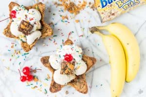 Freshly baked chocolate chip cookies are molded into bowls and piled high with all your favorite ice cream sundae favorites. Now you can have your ice cream and eat the bowl too! The Ultimate Ice Cream Sundae Bowl are an ice cream lovers dream. | Strawberry Blondie Kitchen