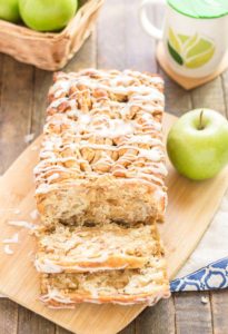 A quick layered bread filled with chopped apples, cinnamon, brown sugar and drizzled with a cream cheese glaze. Sure to give Apple Pie a run for its money! | Strawberry Blondie Kitchen