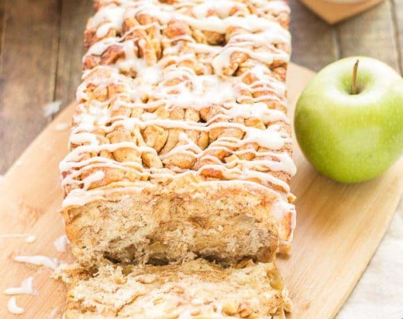 A quick layered bread filled with chopped apples, cinnamon, brown sugar and drizzled with a cream cheese glaze. Sure to give Apple Pie a run for its money! | Strawberry Blondie Kitchen