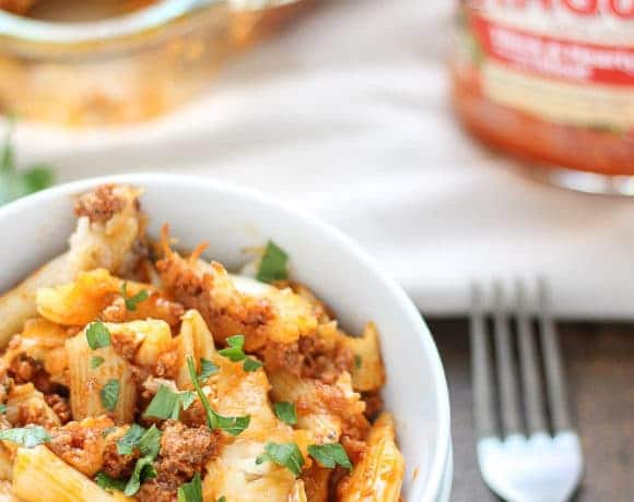 Baked Mostaccioli is loaded with ooey, gooey cheeses and packed with meat thanks to RAGÚ® Homestyle Thick & Hearty Meat Sauce. It's the perfect comfort food any night of the week and sure to become a family favorite! | Strawberry Blondie Kitchen