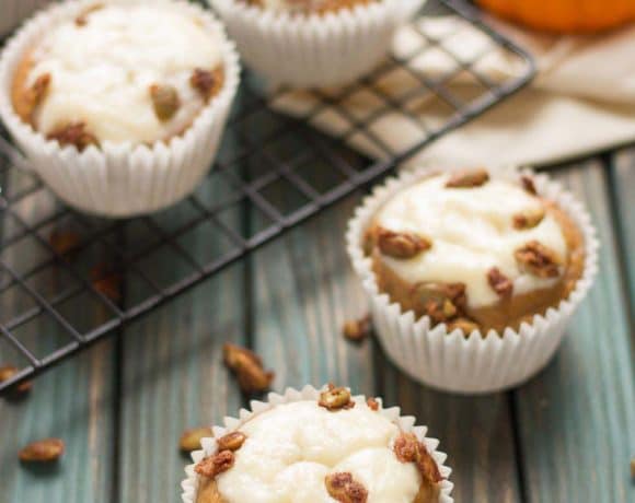 Pumpkin Spice Cream Cheese Muffins are the quintessential treat of Fall. Filled with aromatic autumn spices, stuffed with cream cheese and sprinkled with sugared pepitas, this is sure to be your go to Pumpkin Spice Cream Cheese Muffins recipe. | Strawberry Blondie Kitchen