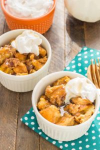 Warm and toasty, this Pumpkin Bread Pudding with Brown Sugar Sauce is pure bliss and then taken to another level with sweet brown sugar {whiskey} sauce! | Strawberry Blondie Kitchen