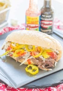 Bolillo rolls are filled with juicy, tender slow cooked beef short ribs, El Yucateco® hot sauce and melty cheese to bring you the ultimate Short Rib Sandwiches. | Strawberry Blondie Kitchen