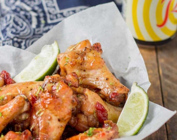 Sweet, tart and tangy, these Cherry Lime Baked Wings are delicious and addictive. Be sure to make a big batch, they're sure to be the hit of your next game day party! | Strawberry Blondie Kitchen