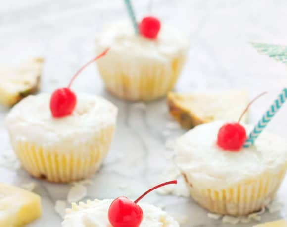 Piña Colada Ice Cream Bites are the perfect treat to cool down this summer. Layers of coconut crust, pureed pineapple and Coconut ProYo High Protein Low Fat Ice Cream make these your new summertime dessert. | Strawberry Blondie Kitchen