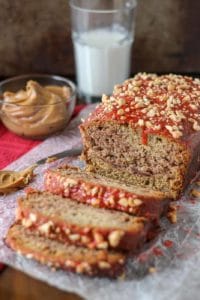 Peanut Butter and Jelly Banana Bread is a PB & J lovers dream!  Switch up the jelly to create your ultimate sandwich in a baked bread form. | Strawberry Blondie Kitchen
