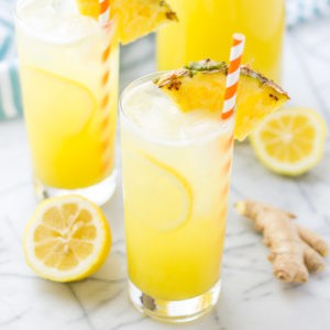 Pineapple pairs with spicy ginger and tart lemonade in sweet harmony to create this Pineapple Ginger Lemonade that is worthy of your next summertime sipper! | Strawberry Blondie Kitchen