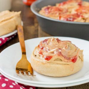 Peanut Butter and Jelly Breakfast Rolls are stuffed with jelly and topped with a delicious peanut butter frosting! The best breakfast roll yet!