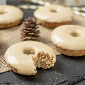 These Apple Cider Donuts with Maple Frosting are perfect on a crisp fall morning with a hot cup of coffee.  They're moist, delicious and bursting with apple and maple flavors. | Strawberry Blondie Kitchen
